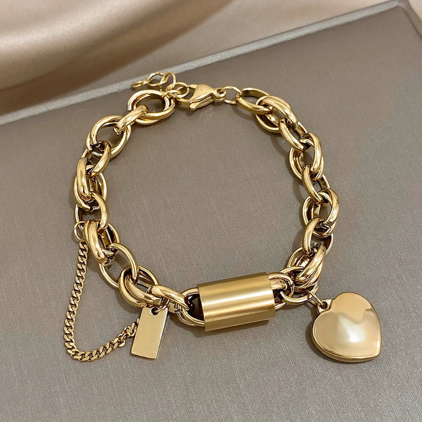 Bracciale spesso a cuore in oro